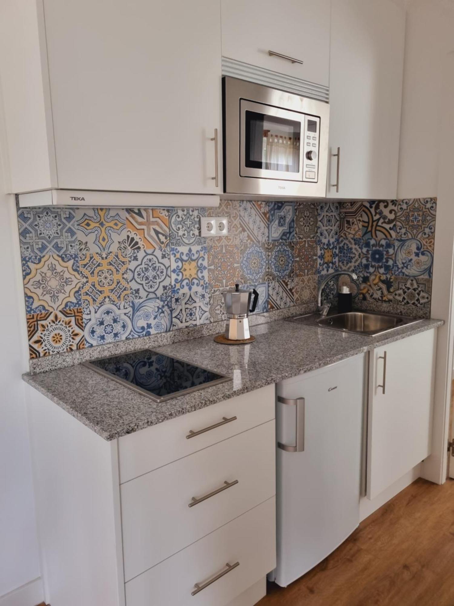 Maile Apartamentos Потес Стая снимка